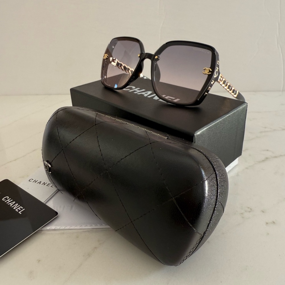 CHANEL Black and Gold Sunglasses